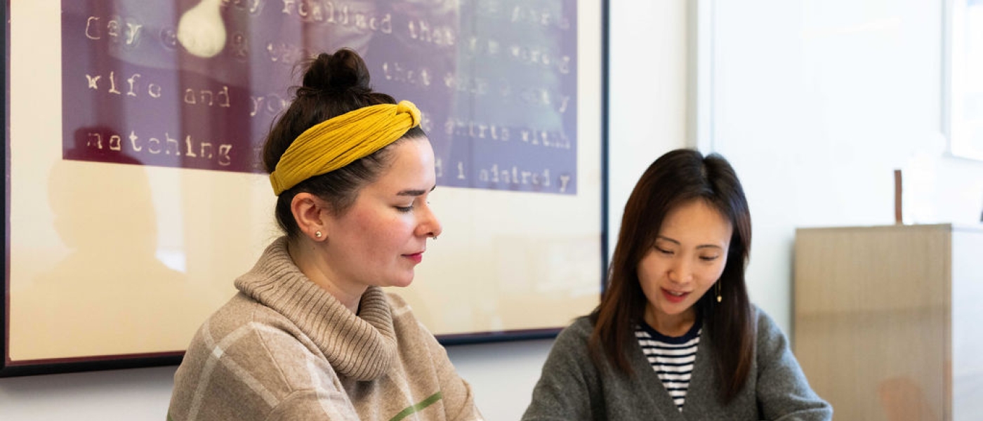 Photo of two Agency staff members working